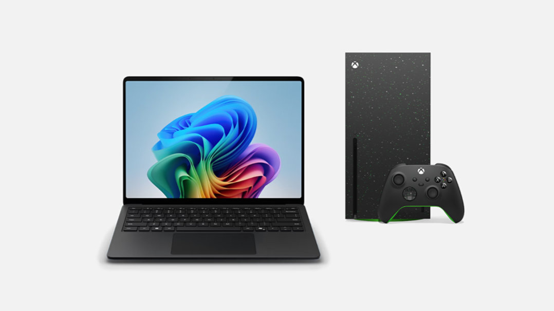 13 inch Black Surface Laptop beside XBOX Series X Special Edition plus controller.