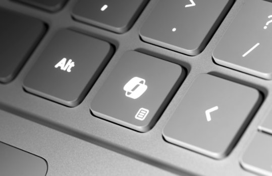 A close-up of the dedicated Copilot key on the keyboard of a Surface Laptop.
