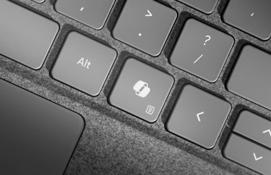 A close-up of the dedicated Copilot key on a Surface Pro 13-inch Flex Keyboard for Business.