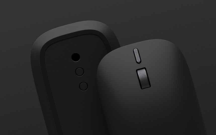 A top and bottom view of Surface Mouse (2nd Edition) in Black.