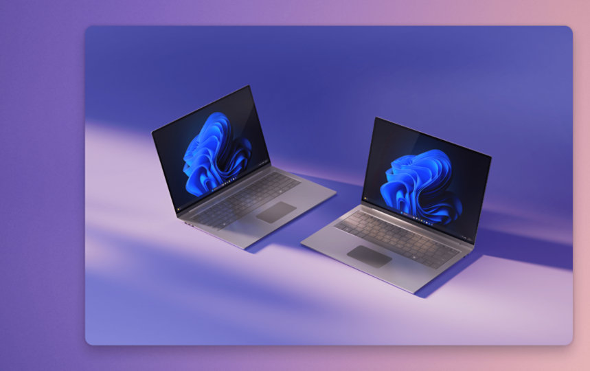 Two laptops facing each other showing how the Windows 10 Pro compares against the Windows 11 Pro for business